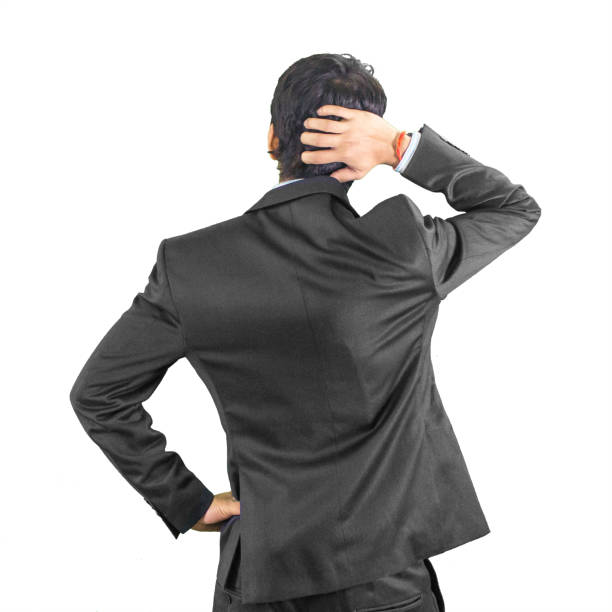 Businessman Scratching the Back of his Head