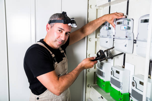 istock Electrician testing equipment in fuse switch box close up 1021053458