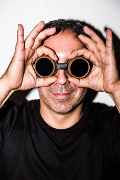 istock Man in steampunk glasseses on white background 1021053752