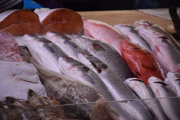 istock Fresh fish on a counter in a food stall 1021078890