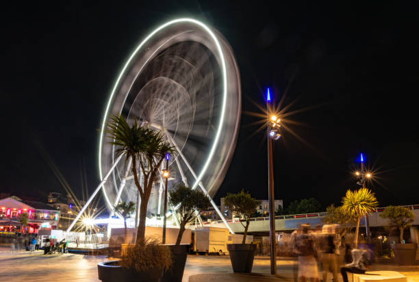 istock Ferris wheel spinning at night in Bournemouth 1021092728