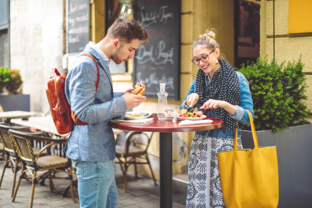 istock Friends are having lunch in a sidewalk cafe 1021096414