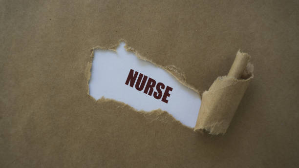 istock nurse written on torn paper 1021101322