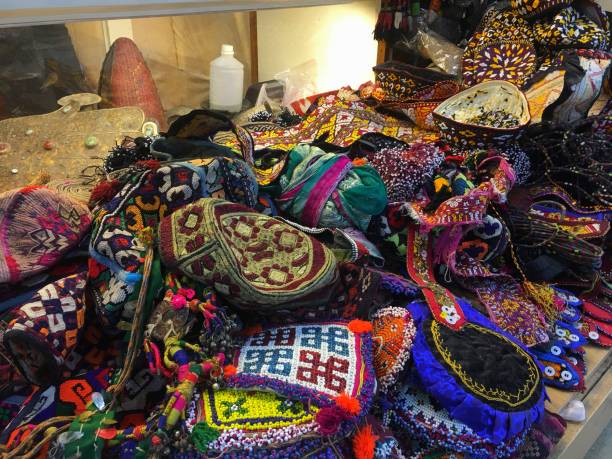 istock Colorful traditional Turkish fabrics and textiles at Grand Bazaar, Istanbul. 1021105486
