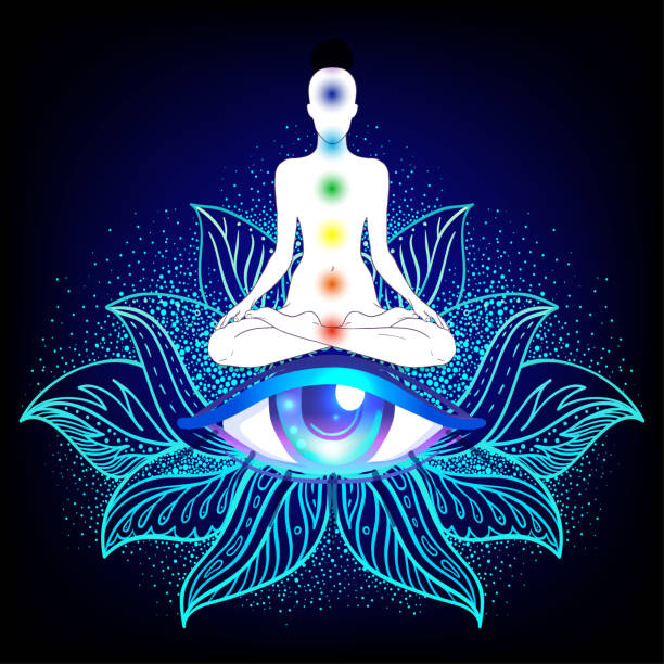 istock Buddha silhouette in lotus position over colorful ornate mandala. 1021108850