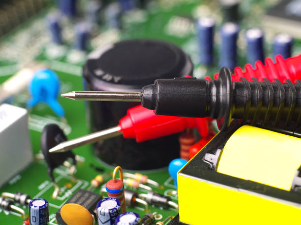 istock multimeter test leads on printed circuit board, closeup, shallow depth of field 1021110980