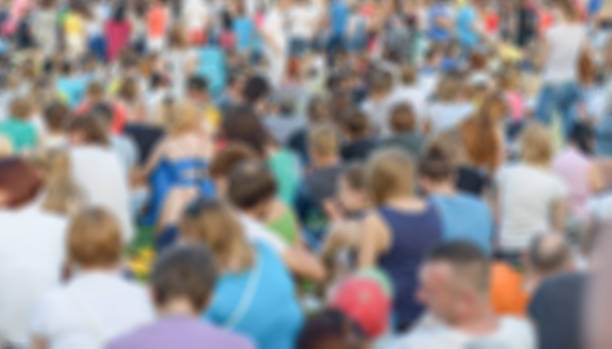 istock Blurred group of people. 1021116360