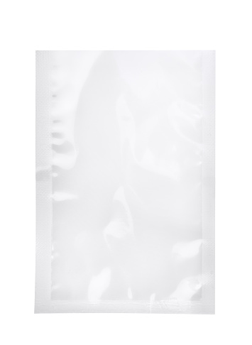 Empty blank transparent plastic bag isolated on white