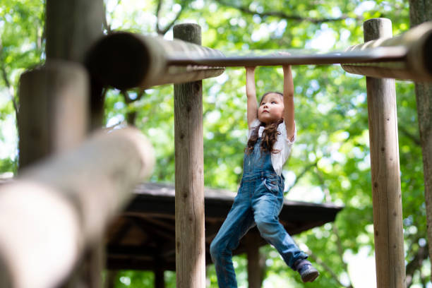 istock Girl playing in the park 1021121670