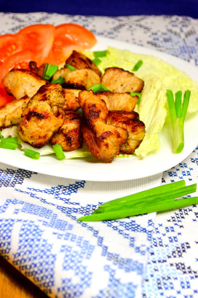 istock Grilled meats,vegetables and herbs in a rustic style 1021137158