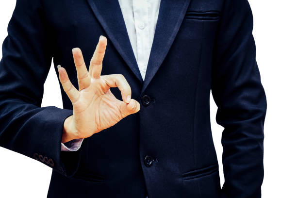 istock Businessman raising his hand OK 1021139512