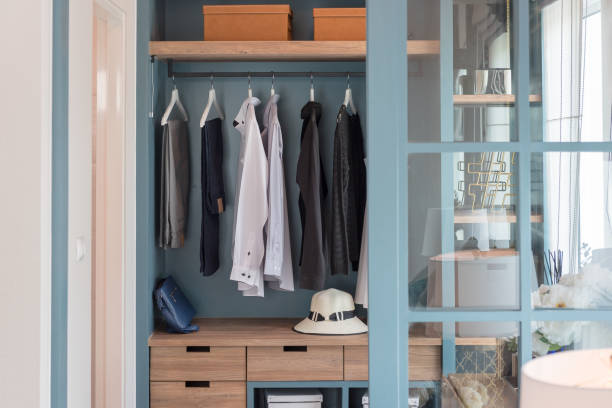 istock modern walk in closet with clothes 1021139776