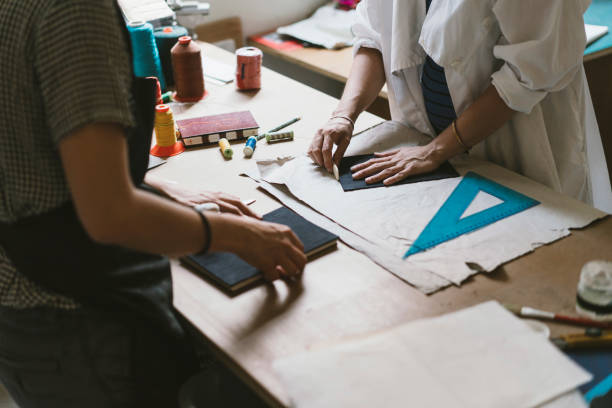 istock Young adult woman making a notebook 1021156050