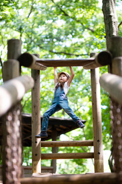 istock Girl playing in the park 1021159174
