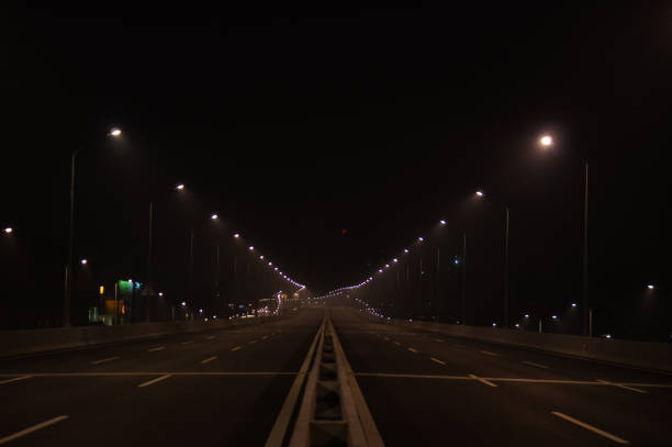 istock Wide Road in the Light at Night 1021162218