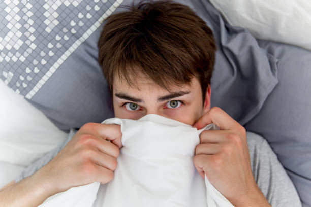 istock Man waking up late for work, he overslept 1021162466