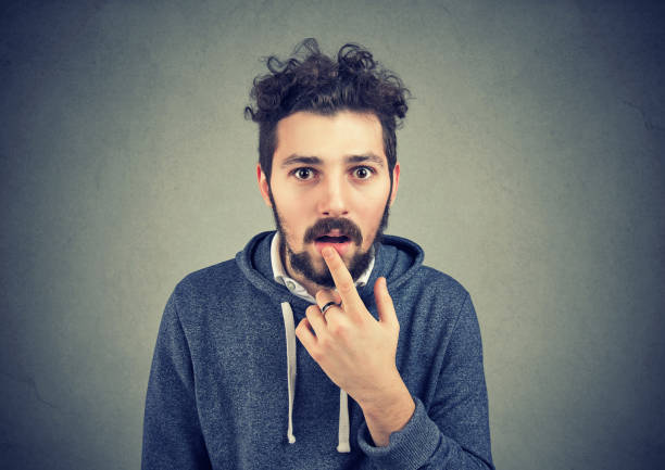 istock Closeup of an amazed stunned young man 1021163218