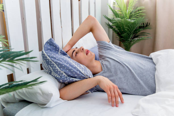 istock Man waking up late for work, he overslept 1021166064