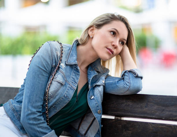 istock Sad woman on the street 1021173152