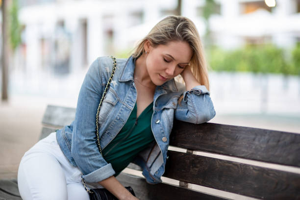 istock Sad woman on the street 1021173246