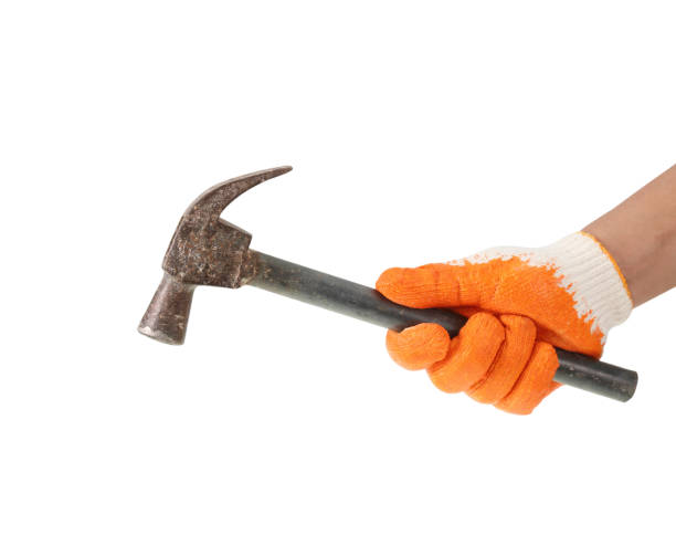 istock Working hand in glove holding a hammer on white background 1021175226