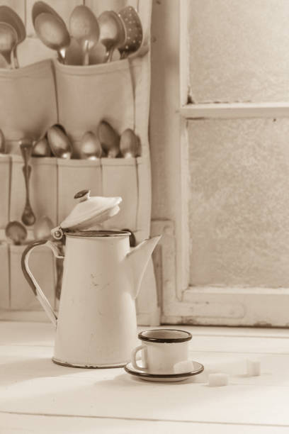 istock Fresh cup and coffee vintage pot with spoons 1021175244