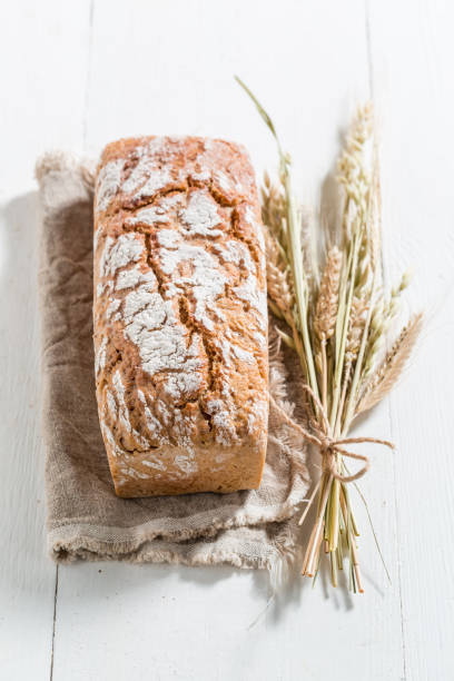istock Top view of bread with several grains on linen cloth 1021178808