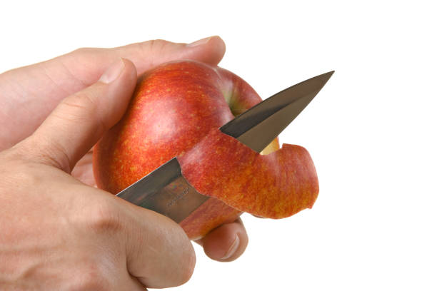 istock cutting peel an apple with a knife 1021184740