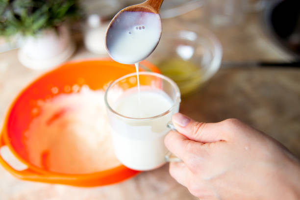 istock Woman making delicious chicken pot pie on a table 1021187188