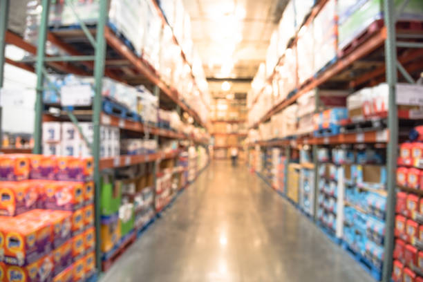 istock Abstract blurred shelves in modern distribution warehouse wholesale 1021192224