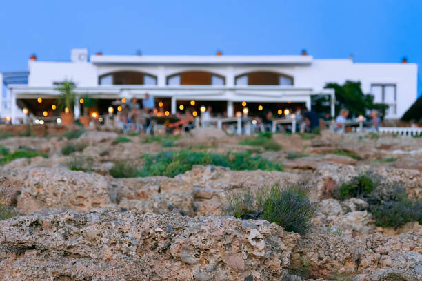 view in blur on a mediterranean restaurant at sunset (Ibiza, Spain)