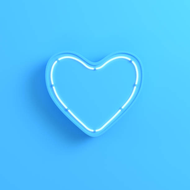 Heart with neon light on bright blue background stock photo