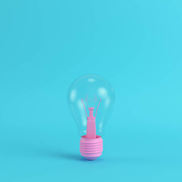 istock Pink light bulb on bright blue background in pastel colors. Minimalism concept 1021211250