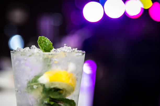 istock Mojito cocktail on a blurry background 1021218148