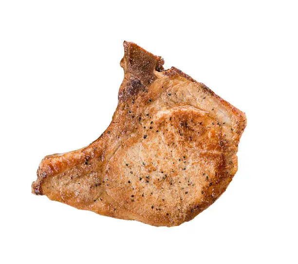 Cooked pork chop isolated on white background