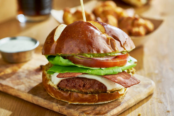istock tasty vegan cheeseburger with meatless bacon alternative 1021233656