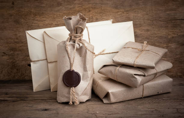 istock pile parcel wrapped with brown kraft paper 1021252248