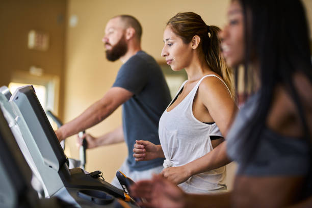 istock group of people in gym using treadmills 1021265348