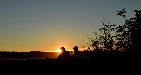 The skies are on fire at Mukilteo, Washington as the sun sets on Puget Sound.