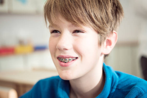 Portrait of a Boy With Dental Braces stock photo