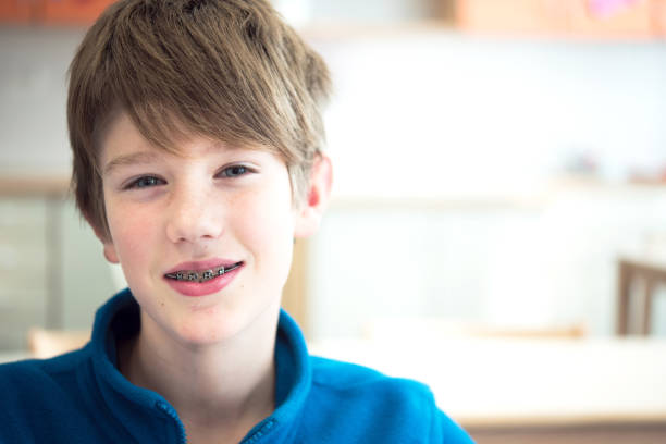 Portrait of a Boy With Dental Braces stock photo