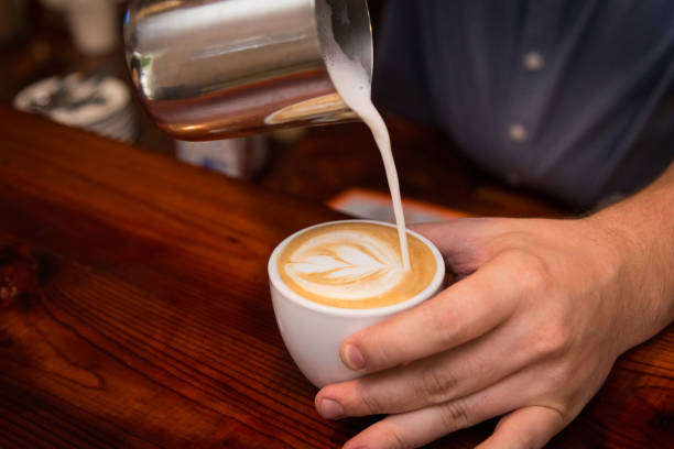 istock Barista prepares cappuccino 1021276394