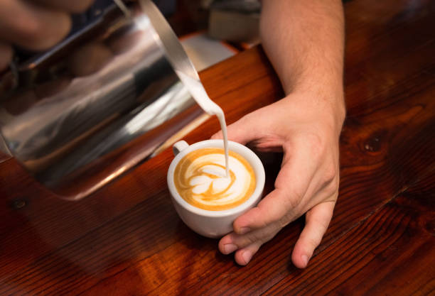 istock Barista prepares cappuccino 1021276404
