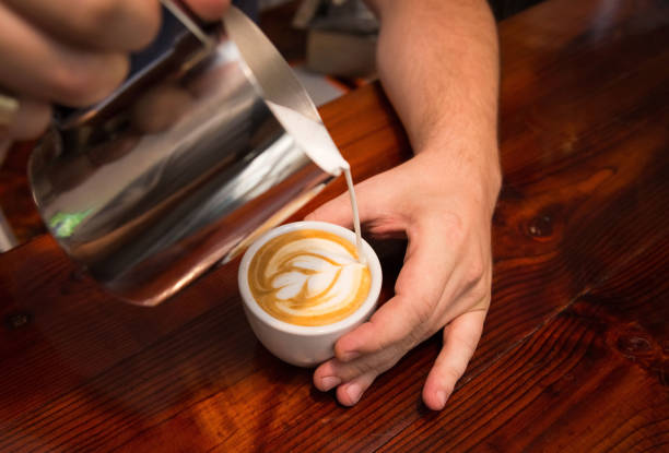 istock Barista prepares cappuccino 1021276460