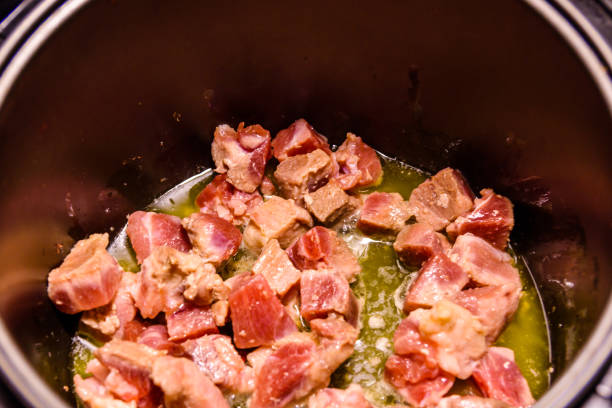 istock Pork meat preparing in a slow cooker 1021291038