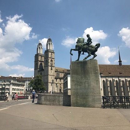 One of four major churches in Zurich, Grossmunster Protestant church is the most imposing. Taken with the statue of Hans Waldmann in the foreground.