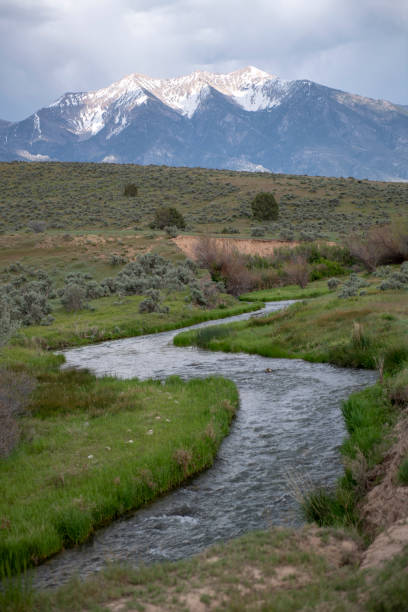 istock Beautiful Utah landscape with snow-capped mountains and stream 1021306566