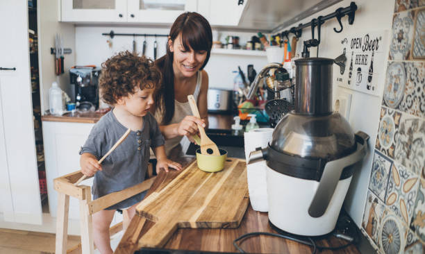 istock Mother and son cooking 1021308368