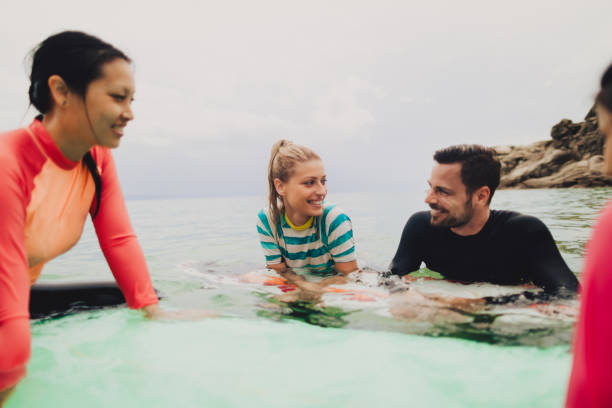 istock Surfing with friends 1021329106