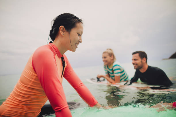 istock Surfing with friends 1021329176